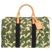 Pre-owned Canvas handbags Louis Vuitton Vintage , Green , Dames