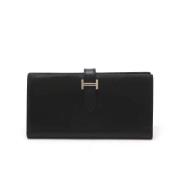 Pre-owned Leather wallets Hermès Vintage , Black , Dames