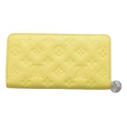 Pre-owned Leather wallets Louis Vuitton Vintage , Yellow , Dames