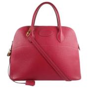 Pre-owned Leather handbags Hermès Vintage , Red , Dames