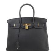 Pre-owned Leather handbags Hermès Vintage , Black , Dames