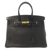 Pre-owned Leather handbags Hermès Vintage , Black , Dames