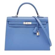 Pre-owned Leather handbags Hermès Vintage , Blue , Dames