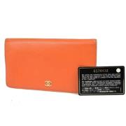 Pre-owned Leather wallets Chanel Vintage , Orange , Dames