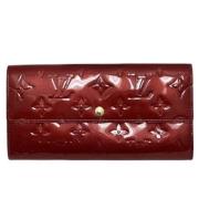 Pre-owned Leather wallets Louis Vuitton Vintage , Red , Dames