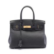 Pre-owned Leather handbags Hermès Vintage , Black , Dames