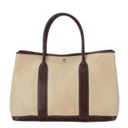 Pre-owned Canvas handbags Hermès Vintage , Beige , Dames