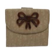 Pre-owned Canvas wallets Dior Vintage , Beige , Dames