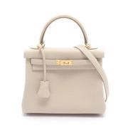 Pre-owned Leather handbags Hermès Vintage , Beige , Dames