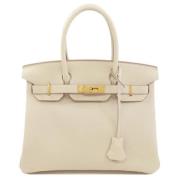 Pre-owned Fabric handbags Hermès Vintage , Beige , Dames