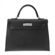 Pre-owned Leather handbags Hermès Vintage , Black , Dames