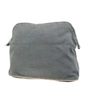 Pre-owned Canvas clutches Hermès Vintage , Gray , Dames