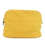 Pre-owned Cotton pouches Hermès Vintage , Yellow , Dames