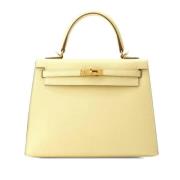 Pre-owned Leather handbags Hermès Vintage , Yellow , Dames