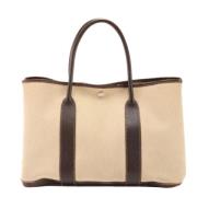 Pre-owned Canvas handbags Hermès Vintage , Beige , Heren