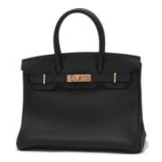 Pre-owned Leather handbags Hermès Vintage , Black , Dames