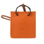 Pre-owned Leather handbags Hermès Vintage , Orange , Dames