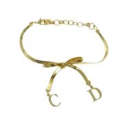 Pre-owned Metal bracelets Dior Vintage , Yellow , Dames