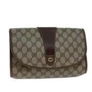 Pre-owned Leather clutches Gucci Vintage , Beige , Dames