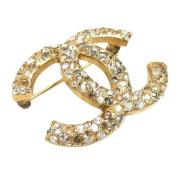 Pre-owned Metal brooches Chanel Vintage , Yellow , Dames