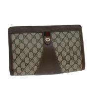 Pre-owned Leather clutches Gucci Vintage , Beige , Dames