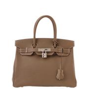 Pre-owned Canvas handbags Hermès Vintage , Brown , Dames