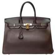 Pre-owned Leather handbags Hermès Vintage , Brown , Dames