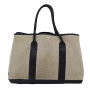 Pre-owned Canvas handbags Hermès Vintage , Beige , Dames