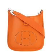 Pre-owned Canvas shoulder-bags Hermès Vintage , Orange , Dames