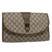 Pre-owned Canvas clutches Gucci Vintage , Beige , Dames