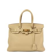 Pre-owned Fabric handbags Hermès Vintage , Beige , Dames