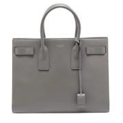 Pre-owned Leather handbags Yves Saint Laurent Vintage , Gray , Dames