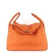 Pre-owned Leather handbags Hermès Vintage , Orange , Dames