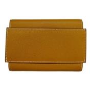 Pre-owned Leather wallets Hermès Vintage , Yellow , Heren