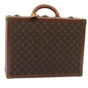 Pre-owned Canvas clutches Louis Vuitton Vintage , Brown , Dames