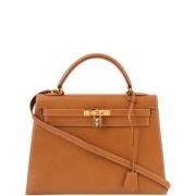 Pre-owned Canvas handbags Hermès Vintage , Brown , Dames