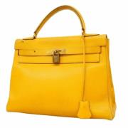 Pre-owned Leather handbags Hermès Vintage , Yellow , Dames