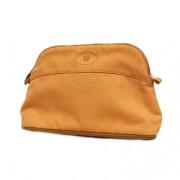 Pre-owned Canvas pouches Hermès Vintage , Orange , Dames