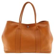 Pre-owned Leather handbags Hermès Vintage , Orange , Dames