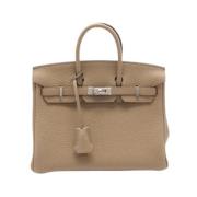 Pre-owned Leather handbags Hermès Vintage , Beige , Dames