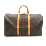 Pre-owned Canvas handbags Louis Vuitton Vintage , Brown , Unisex