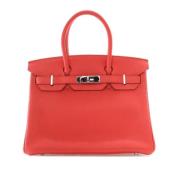 Pre-owned Leather handbags Hermès Vintage , Red , Dames