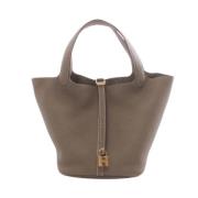 Pre-owned Leather handbags Hermès Vintage , Beige , Dames