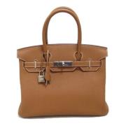 Pre-owned Leather handbags Hermès Vintage , Brown , Dames