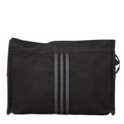 Pre-owned Canvas clutches Hermès Vintage , Black , Dames