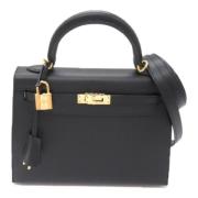 Pre-owned Leather handbags Hermès Vintage , Black , Dames