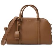 Pre-owned Leather handbags Yves Saint Laurent Vintage , Brown , Dames