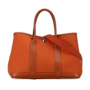 Pre-owned Canvas handbags Hermès Vintage , Orange , Dames