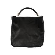 Pre-owned Leather totes Yves Saint Laurent Vintage , Black , Dames