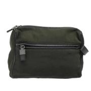 Pre-owned Canvas clutches Salvatore Ferragamo Pre-owned , Green , Dame...